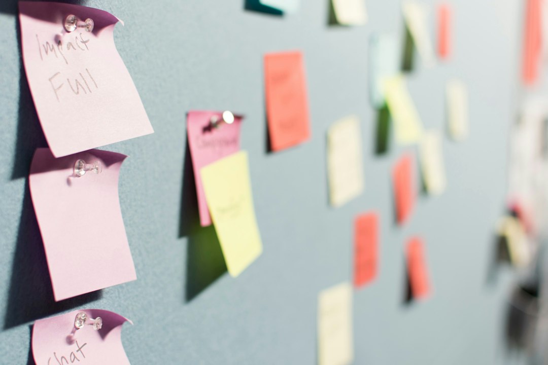 Colorful sticky notes on a planning whiteboard